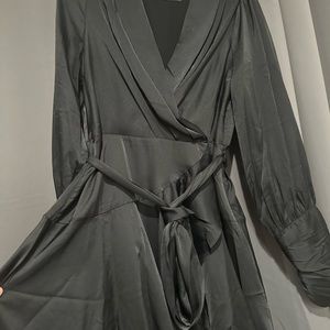Flowy black mini dress, satin, light. Only worn once. No tears or stains.